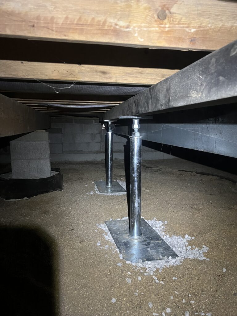 steel beam supported by jacks